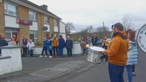 Watch: Marching band joins family and friends for Pat Cox's 100th birthday
