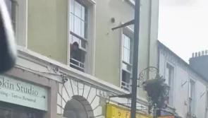 Video appears to show youths kicking door on Dundalk street