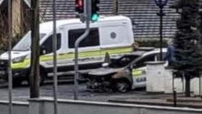 Burnt out patrol car outside Castlefin Garda station