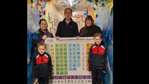 Réalta Sports Club donates communications boards to Carrick-on-Suir primary schools 