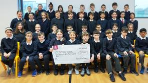 New Tipperary primary schoolchildren present their fundraising cheque to local hospital