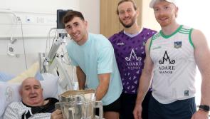All-Ireland champions pay surprise hospital visit to fan who fell off ladder putting up a Limerick flag