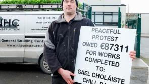 Builder protests outside Gaelcholáiste Chill Dara in Naas, County Kildare