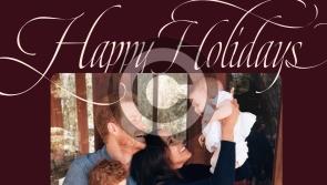 Harry and Meghan smile at daughter Lilibet as Archie looks on in festive message