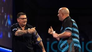 New-look Gary Anderson finds form to defeat Rob Cross and reach quarter-finals