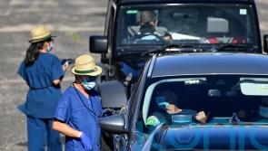 New virus infections driven by Omicron soar in Australia
