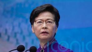 Hong Kong’s leader says media closures unrelated to press freedom