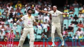 Stuart Broad dismisses David Warner on rainy first day in Sydney
