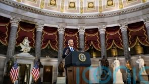 Biden condemns ‘dagger at throat of democracy’ on anniversary of US Capitol riot