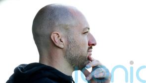Swindon head coach Ben Garner will not try to disrupt Manchester City’s style