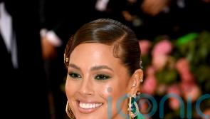 Ashley Graham jokes that twins are having an ‘extended stay’ ahead of birth