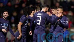 Strong Manchester City side ease past Swindon in FA Cup