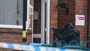 Police cordon off house amid concern for father and eight-year-old son