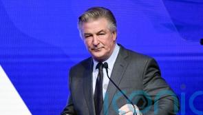 Alec Baldwin surrenders his phone in shooting investigation