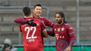 Robert Lewandowski nets hat-trick as Bayern Munich move six points clear at top