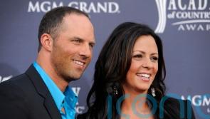 Former quarterback married to singer Sara Evans charged with domestic violence