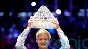 Neil Robertson dominates Barry Hawkins to win second Masters title