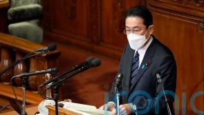 Virus measures and defence are top priorities for Japan’s prime minister