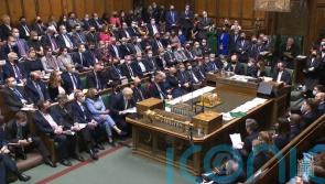 Boris Johnson faces repeated calls to quit during bruising PMQs session