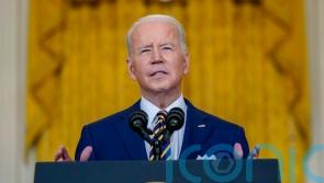 Biden calls on Fed to fight inflation as president marks first year in office