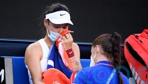 Emma Raducanu knocked out of Australian Open after battle with hand blisters