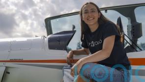 Teenager becomes youngest woman to fly solo around the globe