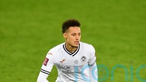 Rhys Williams returns to Liverpool after Swansea loan spell