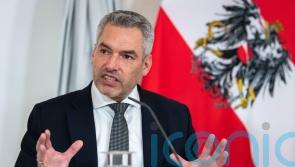 Austrian parliament approves universal vaccine mandate