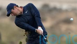 Windy conditions mean Rory McIlroy is relieved to get off the course