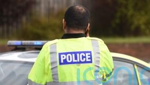 Passenger flown to hospital after car falls from bridge on to motorway