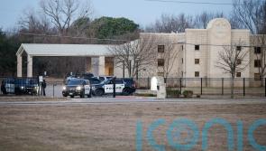 British police granted extra time to quiz men over Texas synagogue stand-off