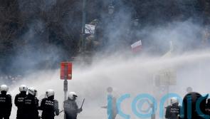Water cannon and tear gas used at Covid-19 protests in Brussels