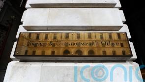 UK begins withdrawing staff and families from embassy in Ukraine