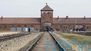 Genocide survivors urge compassion for migrants ahead of Holocaust Memorial Day