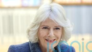 Camilla praised by leading author for championing literature