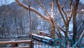 Human chain formed to rescue bus passengers after US bridge collapse