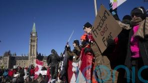 Thousands in Ottawa join protests against Canada’s Covid vaccine mandates