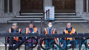 Insulate Britain protesters in custody after gluing themselves to court steps