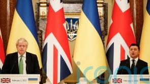 Boris Johnson uses Ukraine trip to urge Russia to ‘step back’