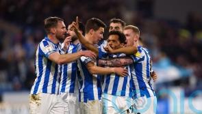 Huddersfield finally break down 10-man Derby to move into play-off spots