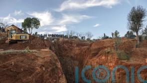 Moroccan rescuers dig down to save boy trapped in well