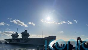 Royal Navy aircraft carrier returns to Portsmouth home base