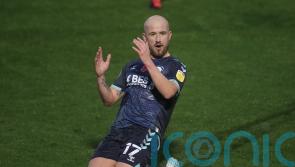 Stockport stay top with narrow win over 10-man Dover