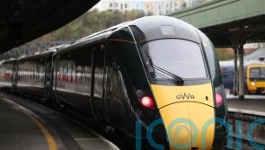 Trackside fire leaves rush-hour commuters stuck on trains
