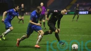 Stockport come from two goals down to rescue a point against 10-man Chesterfield