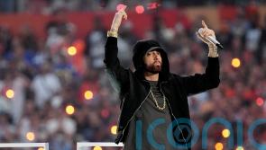 Eminem takes knee in apparent nod to Colin Kaepernick at Super Bowl halftime
