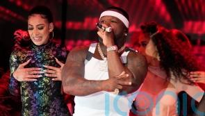 50 Cent makes surprise Super Bowl appearance with strange upside down entrance