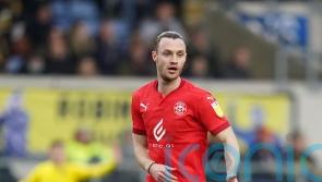 Will Keane could keep starting spot after goalscoring return as Wigan host Crewe