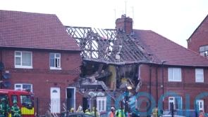 Man injured in suspected gas explosion now in critical but stable condition