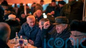 Ukrainian people back at work but ‘not naive about seriousness of situation’